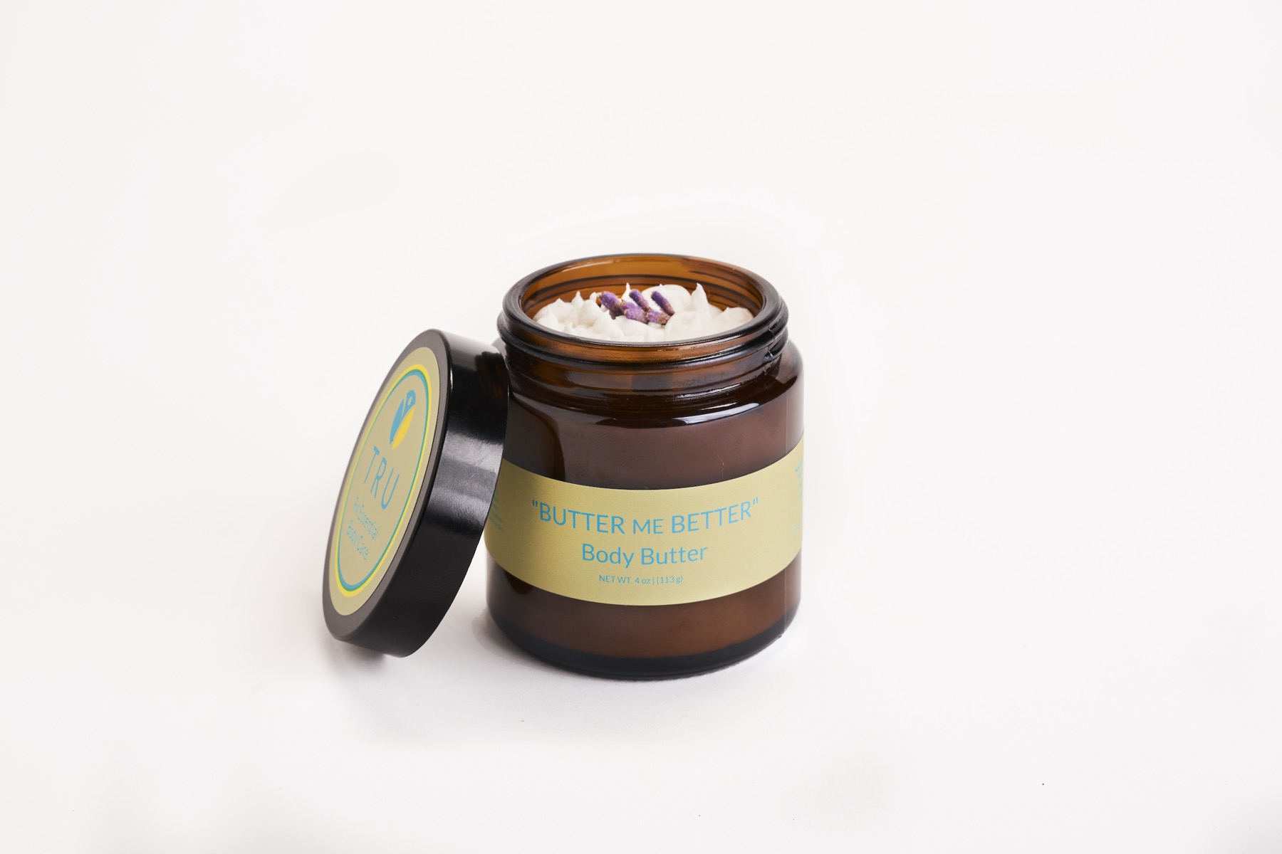 Butter Me Better TRU Rx body butter in an amber glass jar